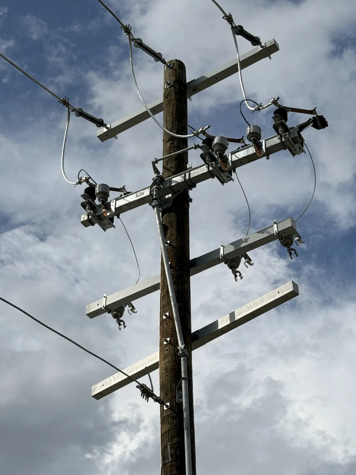 Close view of crossarms and hardware on a framed pole in La Porte, TX